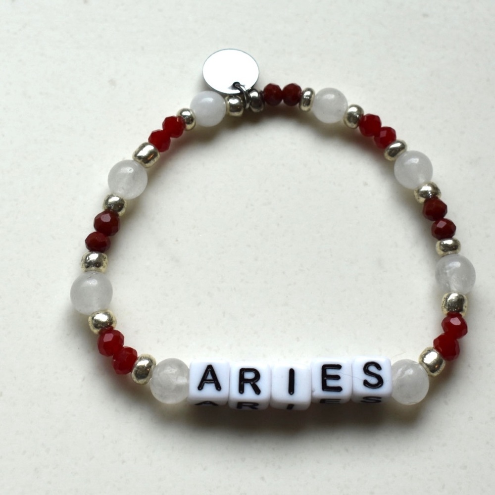 Listing is for one each. Just tell me your sign! Custom made stretch beads